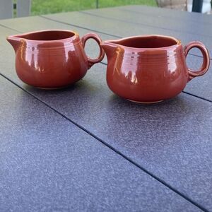 Fiesta lot of 2 cream pitchers paprika homer Laughlin made in USA